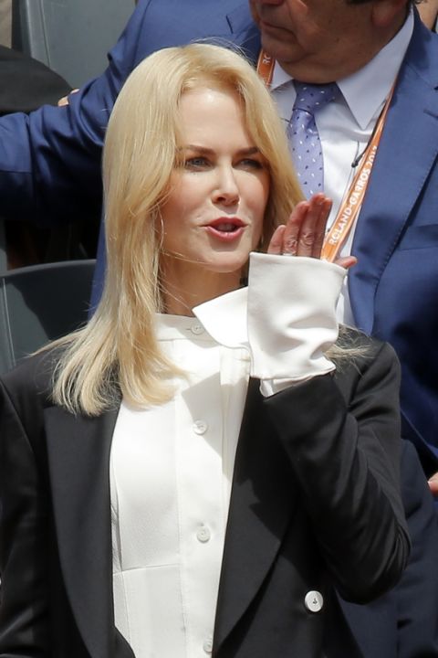 Actress Nicole Kidman blows a kiss to the public as she arrives to watch Spain's Rafael Nadal plays Switzerland's Stan Wawrinka in their final match of the French Open tennis tournament at the Roland Garros stadium, Sunday, June 11, 2017 in Paris. (AP Photo/Michel Euler)