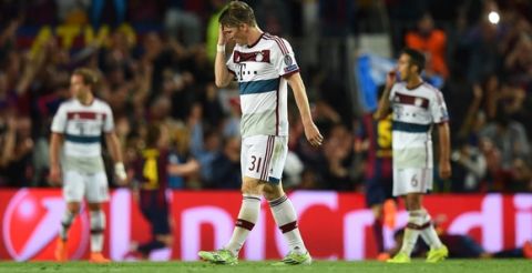 BARCELONA, SPAIN - MAY 06:  Bastian Schweinsteiger (C) of Bayern Muenchen reacts after his team concede two second half goals during the UEFA Champions League Semi Final, first leg match between FC Barcelona and FC Bayern Muenchen at Camp Nou on May 6, 2015 in Barcelona, Spain.  (Photo by Matthias Hangst/Bongarts/Getty Images)
