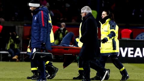 PSG's Neymar leaves the pitch on a stretcher after being injured during the French League One soccer match between Paris Saint-Germain and Marseille at the Parc des Princes Stadium, in Paris, France, Sunday, Feb. 25, 2018. (AP Photo/Thibault Camus)