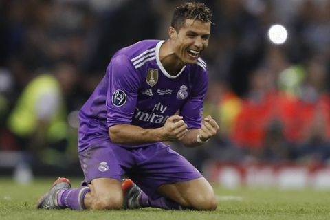 Real Madrid's Cristiano Ronaldo celebrates at the end of the Champions League final soccer match between Juventus and Real Madrid at the Millennium Stadium in Cardiff, Wales, Saturday June 3, 2017. Real Madrid won 4-1. (AP Photo/Kirsty Wigglesworth)