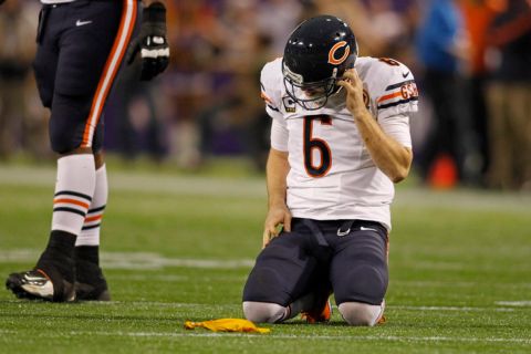 Dec 9, 2012; Minneapolis, MN, USA; Chicago Bears quarterback Jay Cutler (6) gets up slowly after getting hit to the head by the Minnesota Vikings in the fourth quarter at the Metrodome. The Vikings win 24-14. Mandatory Credit: Bruce Kluckhohn-USA TODAY Sports
