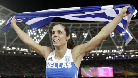Greece's Ekaterini Stefanidi celebrates after winning the gold medal in the women's pole vault during the World Athletics Championships in London Sunday, Aug. 6, 2017. (AP Photo/Matt Dunham)
