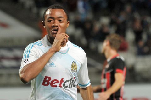 Marseille's French forward Jordan Ayew celebrates after scoring a goal during their French L1 football match Olympique of Marseille versus OGC Nice at the Velodrome stadium in Marseille, southeastern France on November 6, 2011.      AFP PHOTO/GERARD JULIEN (Photo credit should read GERARD JULIEN/AFP/Getty Images)