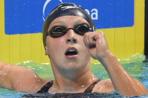United States' Katie Ledecky reacts after winning the gold medal in the women's 1500-meter freestyle final during the swimming competitions of the World Aquatics Championships in Budapest, Hungary, Tuesday, July 25, 2017. (AP Photo/Darko Bandic)