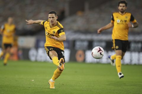 Wolverhampton Wanderers' Daniel Podence attempts a shot at goal during the English Premier League soccer match between Wolves and Newcastle United at Molineux Stadium in Wolverhampton, England, Sunday, Oct. 25, 2020. (Nick Potts/Pool Photo via AP)