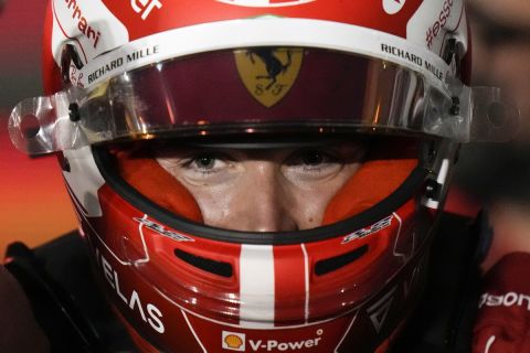 Ferrari driver Charles Leclerc of Monaco smiles after he won the Formula One Bahrain Grand Prix it in Sakhir, Bahrain, Sunday, March 20, 2022. (AP Photo/Hassan Ammar)