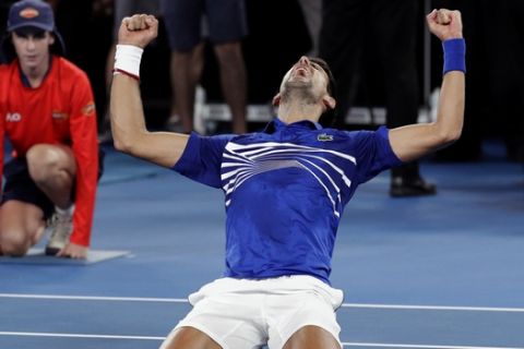 Serbia's Novak Djokovic congratulates, winning over Spain's Rafael Nadal in their men's singles final at the Australian Open tennis championships in Melbourne, Australia, Sunday, Jan. 27, 2019. (AP Photo/Aaron Favila)