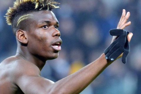 Juventus' Paul Pogba celebrates the victory at the end of the Italian Serie A soccer match Juventus FC vs US Sassuolo at the Juventus Stadium in Turin, Italy, 09 March 2015.
ANSA/ANDREA DI MARCO