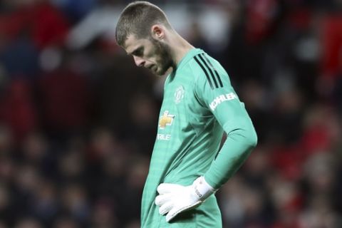 Manchester United goalkeeper David de Gea reacts during the English Premier League soccer match between Manchester United and Manchester City at Old Trafford Stadium in Manchester, England, Wednesday April 24, 2019. (AP Photo/Jon Super)