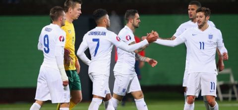 KAUNAS, LITHUANIA - OCTOBER 12:  Alex Oxlade-Chamberlain of England (7) celebrates with Adam Lallana (11) as he scores their third goal during the UEFA EURO 2016 qualifying Group E match between Lithuania and England at LFF Stadionas on October 12, 2015 in Kaunas, Lithuania.  (Photo by Alex Livesey/Getty Images)