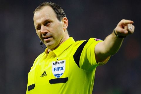 MUNICH, GERMANY - APRIL 09:  Referee Jonas Eriksson reacts during the UEFA Champions League quarter-final second leg match between FC Bayern Muenchen and Manchester United at Allianz Arena on April 9, 2014 in Munich, Germany.  (Photo by Lennart Preiss/Bongarts/Getty Images)