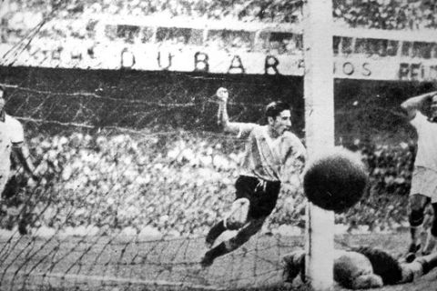 FILE- In this July 16, 1950, file photo, Uruguay player Ghiggia scores during the World Cup Final, against Brazil, in the Maracana Stadium in Rio de Janeiro, Brazil Uruguay won 2-1. An estimated 199,854 fans watched the 1950 World Cup final at Maracana. (AP Photo/File)