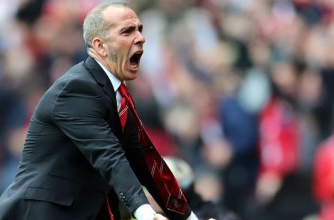 Sunderland's manager Paolo Di Canio celebrates after Phil Bardsley scored his goal during their English Premier League soccer match against Southampton at the Stadium of Light, Sunderland, England, Sunday, May 12, 2013. (AP Photo/Scott Heppell)
