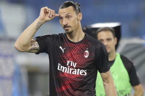 AC Milan's Zlatan Ibrahimovic gestures during an Italian Serie A soccer match between Spal and Milan at the Paolo Mazza stadium in Ferrara, Italy, Wednesday, July 1, 2020. Filippo Rubin/LaPresse via AP)