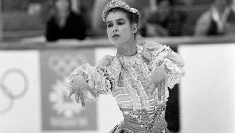 Katarina Witt of East Germany performs a Slavic dance on skates during her performance in Olympic short skating program in Sarajevo, Yugoslavia, Thursday, Feb. 17, 1984 during the XIV Olympic Winter Games.  (AP Photo/Massimo Sambucetti)