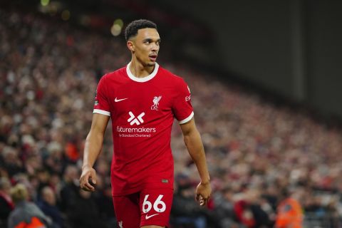 Liverpool's Trent Alexander-Arnold walks during the English Premier League soccer match between Liverpool and Manchester United at the Anfield stadium in Liverpool, England, Sunday, Dec.17, 2023. (AP Photo/Jon Super)