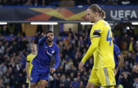 Chelsea's Ruben Loftus-Cheek, left, celebrates after scoring his side's opening goal during a Group L Europa League soccer match between Chelsea and BATE at Stamford Bridge stadium in London, Thursday, Oct. 25, 2018. (AP Photo/Alastair Grant)