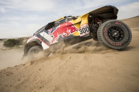 It was another masterful performance from 13-time champion Stéphane Peterhansel though as he safely navigated the soft sand dunes to win the stage from Bernhard ten Brinke and extend his overall lead to 30 minutes from Carlos Sainz. // Stephane Peterhansel (FRA) of Team Peugeot Total races during stage 05 of Rally Dakar 2018 from San Juan de Marcona, to Arequipa, Peru January 10, 2018 // Marcelo Maragni/Red Bull Content Pool via AP Images  // For more content, pictures and videos like this please go to http://www.redbullcontentpool.com