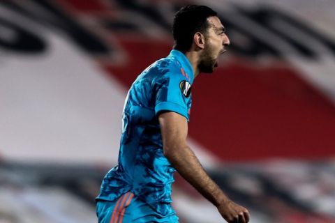 Ο Χασάν πανηγυρίζει το γκολ του στην αναμέτρηση του Ολυμπιακού με την Αϊντχόφεν για τη φάση των 32 του Europa League.