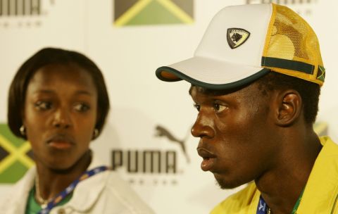 ** CORRECTS CAMPBELL'S GIVEN NAME **Jamaican runners Usain Bolt, and Veronica Campbell listens to a question, during a press conference in Helsinki, Thursday Aug. 4, 2005, where the 10th World Athletics Championships,  are scheduled to begin later this week.(AP Photo/Anja Niedringhaus)