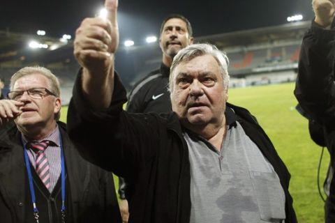 Montpellier's President Louis Nicollin thanks supporters after Montpellier defeated Auxerre 2-1 and won its first title in the French League one soccer championship, at the Abbe Deschamps stadium in Auxerre, central France, Sunday, May 20, 2012. (AP Photo/Thibault Camus)