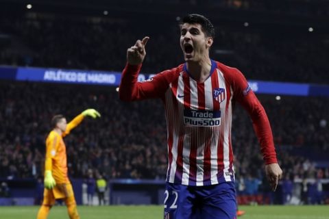Atletico forward Alvaro Morata reacts after scoring his side's opening goal but the goal was disallowed after a review by VAR during the Champions League round of 16 first leg soccer match between Atletico Madrid and Juventus at Wanda Metropolitano stadium in Madrid, Wednesday, Feb. 20, 2019. (AP Photo/Manu Fernandez)