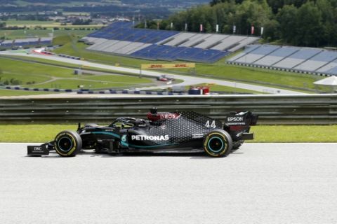 Mercedes driver Lewis Hamilton of Britain steers his car during the first practice session at the Red Bull Ring racetrack in Spielberg, Austria, Friday, July 3, 2020. The Austrian Formula One Grand Prix will be held on Sunday. (AP Photo/Darko Bandic)