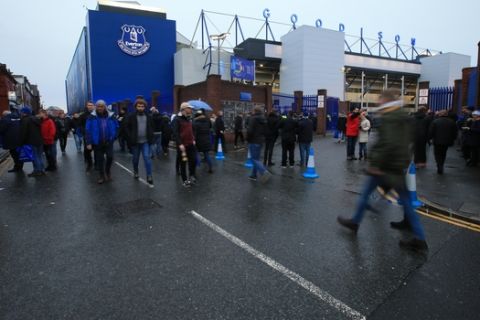 Everton's fans outside the Goodison Park Stadium prior to the start of the English Premier League soccer match between Everton and Tottenham in Liverpool, England, Sunday, Dec. 23, 2018. (AP Photo/Jon Super)