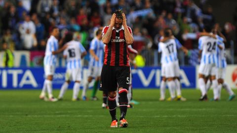 AC Milan's French defender Philippe Mexes reacts at the end of the UEFA Champions league football match Malaga CF vs AC Milan on October 24, 2012 at the Rosaleda stadium in Malaga. Malaga defeated Milan 1-0.   AFP PHOTO / JORGE GUERRERO        (Photo credit should read Jorge Guerrero/AFP/Getty Images)