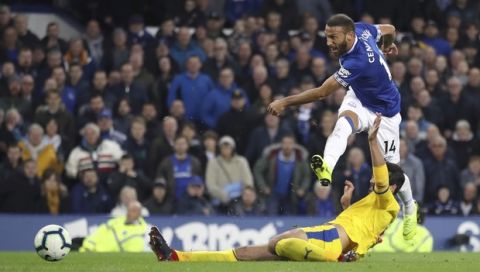 Everton's Cenk Tosun scores his side's second goal of the game against Crystal Palace during their English Premier League soccer match at Goodison Park in Liverpool, England, Sunday, Oct. 21, 2018. (Tim Goode/PA via AP)