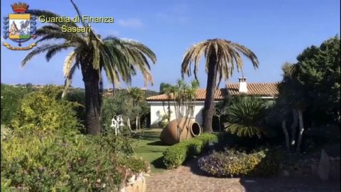 This frame taken from a video shows a villa in Porto Cervo on the Italian Sardinia island seized by the Italian Police. The villa, valued at seven million euros ($8.3 million) , was allegedly how a Qatari television executive bribed a top FIFA official. Italian police said Friday, Oct. 13, 2017 they seized the luxury property in Sardinia they claim Nasser al-Khelaifi, who is also president of Paris Saint-Germain, made available to former FIFA secretary general Jerome Valcke. Details of the alleged corruption were revealed one day after Swiss federal prosecutors oversaw evidence-gathering raids in four European countries for a widening investigation of FIFA and the 2018-2022 World Cup bidding contests won by Russia and Qatar. (Guardia di Finanza via AP)