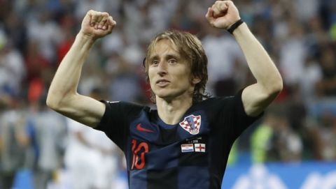 Croatia's Luka Modric celebrates after his team advanced to the final during the semifinal match between Croatia and England at the 2018 soccer World Cup in the Luzhniki Stadium in Moscow, Russia, Wednesday, July 11, 2018. (AP Photo/Alastair Grant)