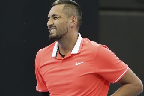 Nick Kyrgios of Australia reacts after missing a shot during his match against Jeremy Chardy of France at the Brisbane International tennis tournament in Brisbane, Australia, Wednesday, Jan. 2, 2019. (AP Photo/Tertius Pickard)