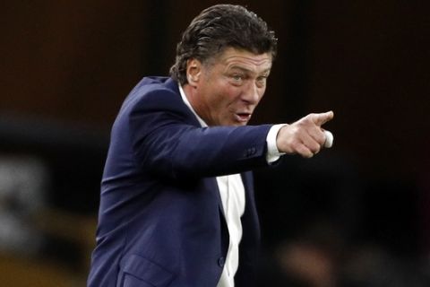 Torino's head coach Walter Mazzarri gestures during the Europa League qualifying second leg play-off soccer match between Wolverhampton Wanderers and Torino at the Molineux Stadium in Wolverhampton, England, Thursday, Aug. 29, 2019. (AP Photo/Rui Vieira)