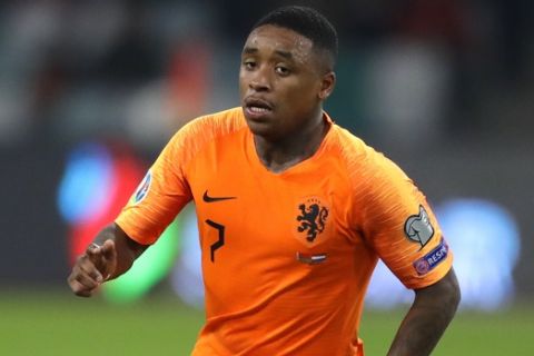 Netherlands' Steven Bergwijn in action during the Euro 2020 group C qualifying soccer match between Belarus and Netherlands at the Dinamo stadium in Minsk, Belarus, Sunday, Oct. 13, 2019. (AP Photo/Sergei Grits)