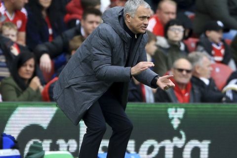 Manchester United manager Jose Mourinho gestures during their English Premier League soccer match against Middlesbrough at the Riverside Stadium, Middlesbrough, England, Sunday, March 19, 2017. (Nigel French/PA via AP)