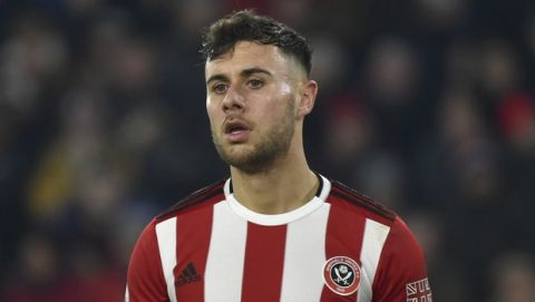 Sheffield United's George Baldock during the English Premier League soccer match between Sheffield United and Manchester City at Bramall Lane in Sheffield, England, Tuesday, Jan. 21, 2020. (AP Photo/Rui Vieira)