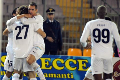 Lazio's forward from Kosovo Lorik Cana celebrates after scoring against Lecce during their Italian Serie A football match on December 10, 2011 at  Via del mare stadium in Lecce. AFP PHOTO / Tiziana Fabi (Photo credit should read TIZIANA FABD/AFP/Getty Images)