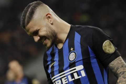 Inter Milan's Mauro Icardi grimaces during a Serie A soccer match between Inter Milan and Chievo, at the San Siro stadium in Milan, Italy, Monday, May 13, 2019. (AP Photo/Luca Bruno)