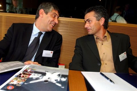 Europe's top soccer coaches from Portugal Jose Mourinho, right, FC Porto, speaks with Fernando Santos, left, Panathinaikos FC, before the UEFA  Elite Coaches forum meeting at the UEFA headquarters, in Nyon, Switzerland, Wednesday, Sept. 4, 2002. UEFA is staging  the fourth Elite Coaches Forum with the aim of allowing leading technician in European soccer to exchange views and to make suggestions about the future of soccer in Europe. (AP Photo/Keystone/Laurent Gillieron)