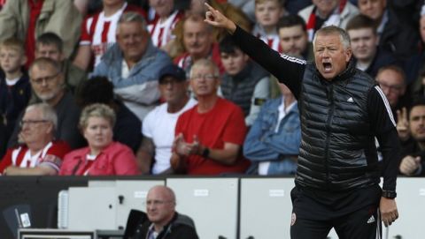 Sheffield United's manager Chris Wilder shouts during the English Premier League soccer match between Sheffield United and Crystal Palace at Bramall Lane in Sheffield, England, Sunday, Aug. 18, 2019. (AP Photo/Rui Vieira)
