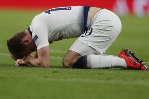 Tottenham's Harry Kane lies on the pitch during the Champions League, round of 8, first-leg soccer match between Tottenham Hotspur and Manchester City at the Tottenham Hotspur stadium in London, Tuesday, April 9, 2019. (AP Photo/Frank Augstein)
