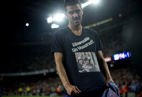 Barcelona's forward David Villa celebrates after scoring a goal during the Spanish League football match between FC Barcelona and Real Sociedad at the Camp Nou stadium in Barcelona on August 19, 2012. AFP PHOTO/ JOSEP LAGO        (Photo credit should read JOSEP LAGO/AFP/GettyImages)
