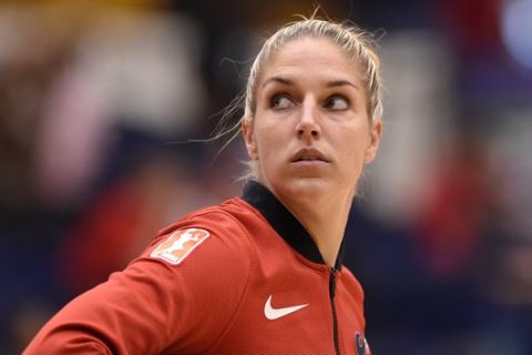 Washington Mystics guard Elena Delle Donne warms up before a single elimination WNBA basketball playoff game against the Los Angeles Sparks, Thursday, Aug. 23, 2018, in Washington. (AP Photo/Nick Wass)