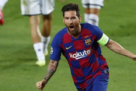 Barcelona???s Lionel Messi celebrates after scoring his side???s second goal during the Champions League round of 16, second leg soccer match between Barcelona and Napoli at the Camp Nou Stadium in Barcelona, Spain, Saturday, Aug. 8, 2020. (AP Photo/Joan Monfort)