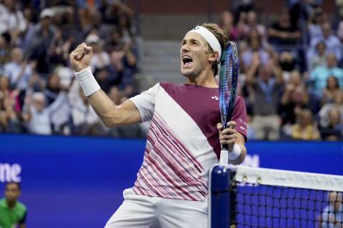 Casper Ruud, of Norway, reacts after scoring a point against Carlos Alcaraz, of Spain, during the men's singles final of the U.S. Open tennis championships, Sunday, Sept. 11, 2022, in New York. (AP Photo/John Minchillo)