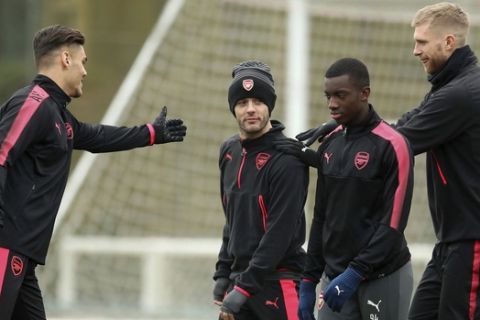 Arsenal's Jack Wilshere, second left, attends a training session with teammates at London Colney, Wednesday Feb. 21, 2018. (Adam Davy/PA via AP)