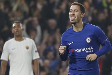 Chelsea's Eden Hazard celebrates after scoring during the Champions League group C soccer match between Chelsea and Roma at Stamford Bridge stadium in London, Wednesday, Oct. 18, 2017. (AP Photo/Kirsty Wigglesworth)