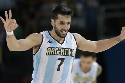 Argentina's Facundo Campazzo (7) celebrates a score against Brazil during a men's basketball game at the 2016 Summer Olympics in Rio de Janeiro, Brazil, Saturday, Aug. 13, 2016. (AP Photo/Eric Gay)