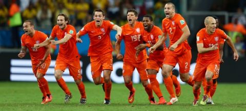 SALVADOR, BRAZIL - JULY 05:  Wesley Sneijder, Daley Blind, Stefan de Vrij, Klaas-Jan Huntelaar, Jeremain Lens, Ron Vlaar and Arjen Robben of the Netherlands celebrate victory in a penalty shootout against Costa Rica during the 2014 FIFA World Cup Brazil Quarter Final match between the Netherlands and Costa Rica at Arena Fonte Nova on July 5, 2014 in Salvador, Brazil.  (Photo by Michael Steele/Getty Images)
